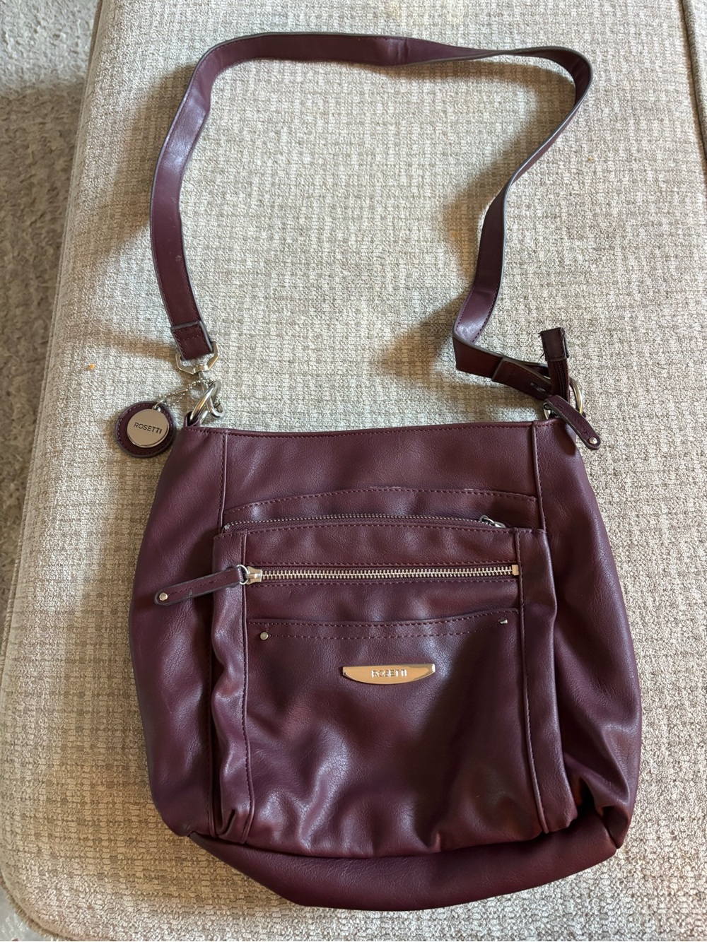 Rosetti Deep Wine/Purple Crossbody Bag with Front Zip Pocket